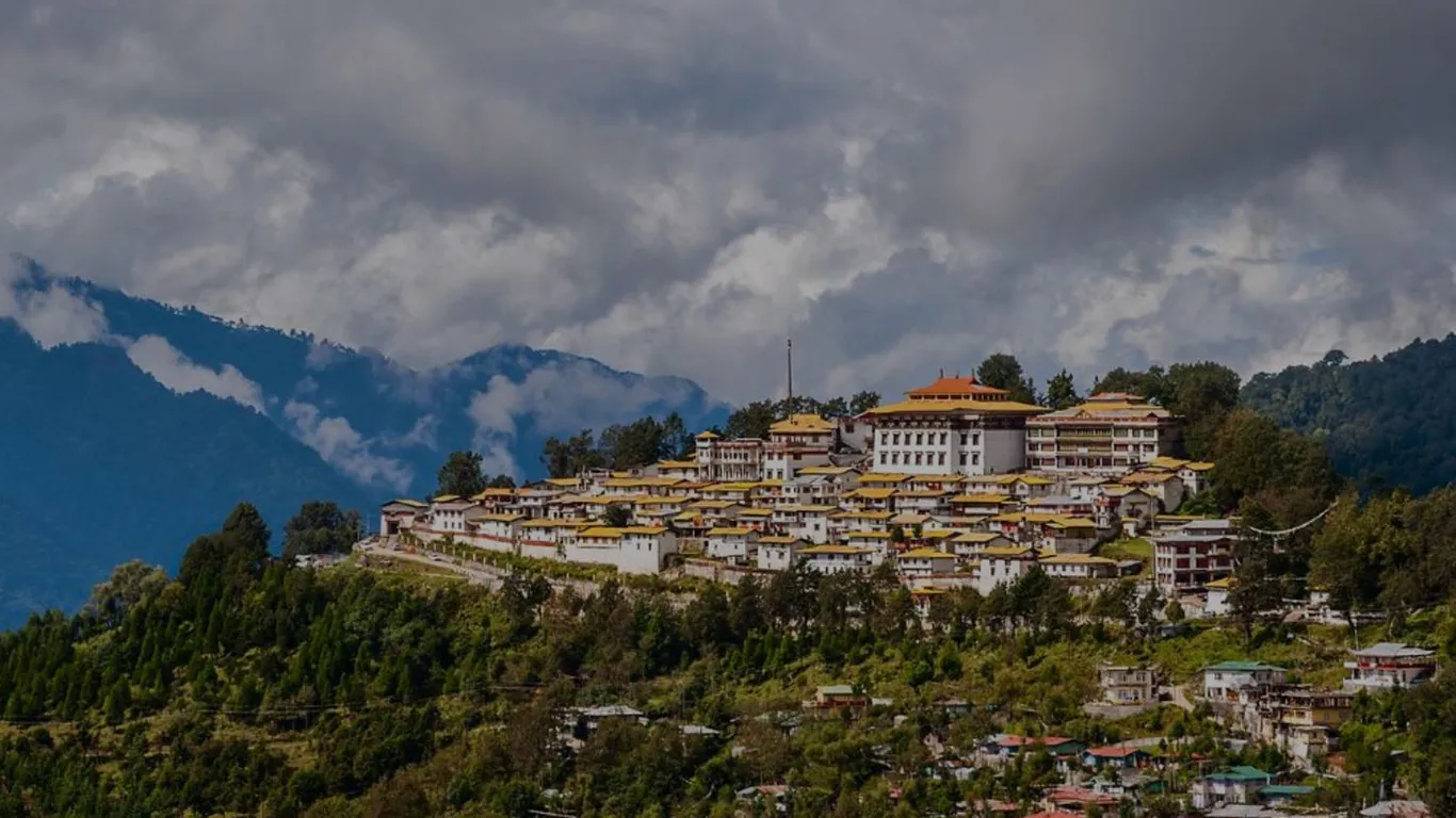 Colorful Buddhist prayer flags fluttering in the mountain breeze at Tawang